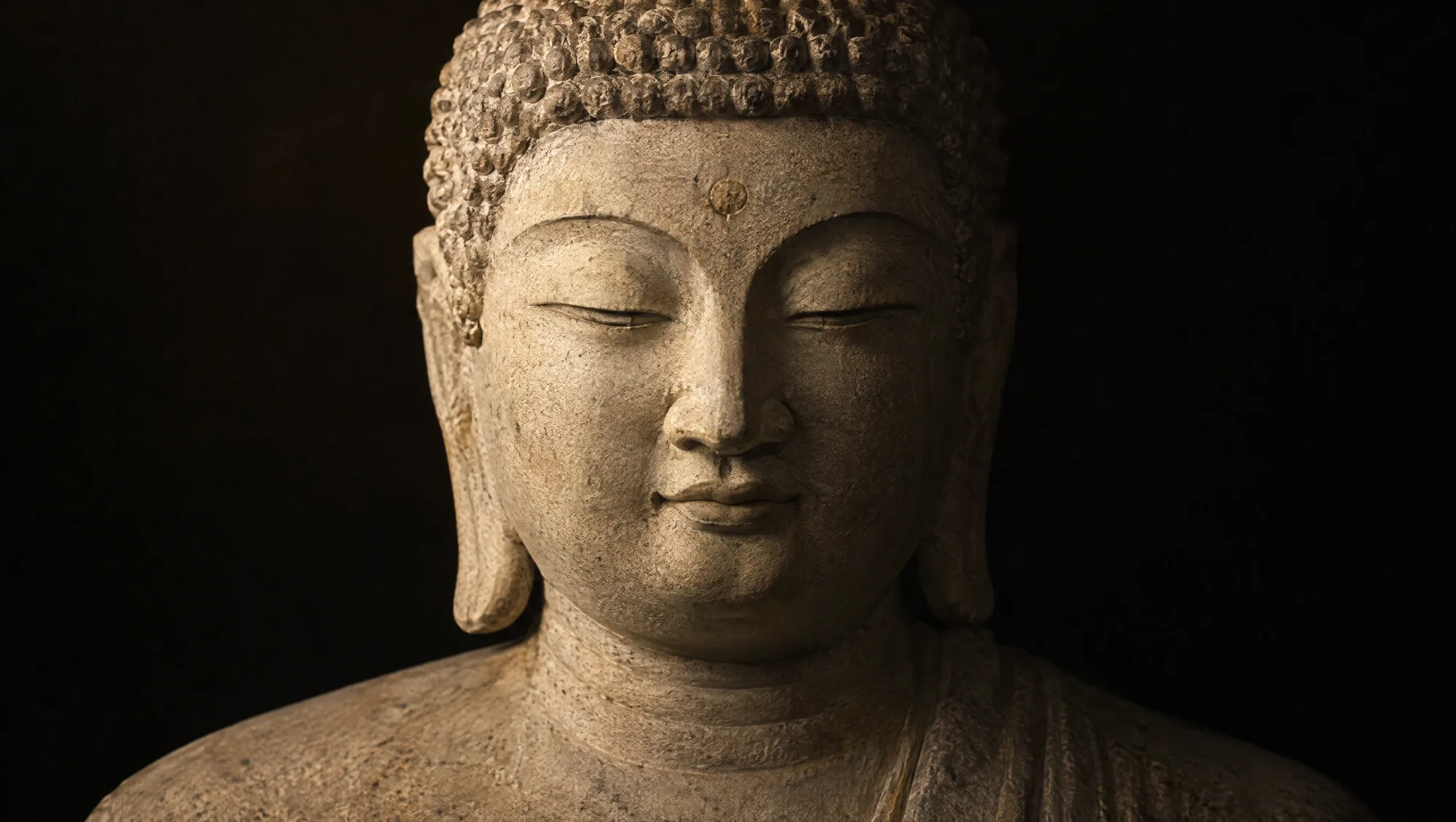 The Seokguram Buddha in smooth white granite, serene and symmetrical